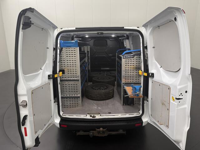 Ford TRANSIT CUSTOM 2.0TDCi 130PK Lang | Werkplaat inrichting | Dakdraagsysteem | Navigatie | Camera | Trekhaak | Airco | 3-Zits