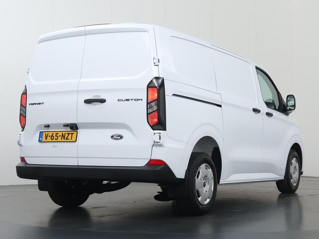 Ford TRANSIT CUSTOM 300 | 2.0 TDCI | L1 H1 | TREND | AIRCO | CRUISE CONTROL | CAMERA | CARPLAY EN ANDROID AUTO | 3-ZITS | VOORRUITVERWARMING | 2740 AHW TREKHAAK MOGELIJK | LED | CLIMATE CONTROL
