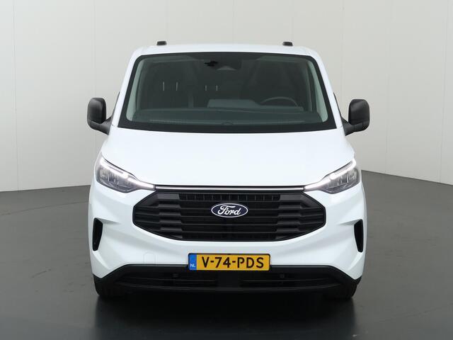 Ford TRANSIT CUSTOM 300 | 2.0 TDCI | L1 H1 | TREND | AIRCO | CRUISE CONTROL | CAMERA | CARPLAY EN ANDROID AUTO | 3-ZITS | VOORRUITVERWARMING | 2740 AHW TREKHAAK MOGELIJK | LED | CLIMATE CONTROL