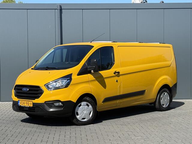 Ford TRANSIT CUSTOM 2.0 TDCI / L2H1 / 1e EIG. / AIRCO / CRUISE / 2.8 TONS TREKHAAK / STOELVERW / PDC / DAKDRAGERS