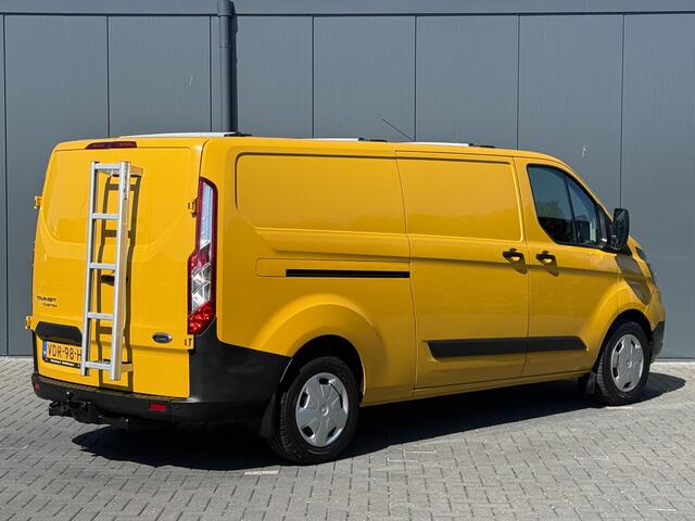 Ford TRANSIT CUSTOM 2.0 TDCI / L2H1 / 1e EIG. / AIRCO / CRUISE / 2.8 TONS TREKHAAK / STOELVERW / PDC / DAKDRAGERS