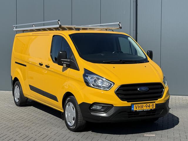 Ford TRANSIT CUSTOM 2.0 TDCI / L2H1 / 1e EIG. / TREKHAAK / IMPERIAAL / AIRCO / CRUISE / LED / STOELVERW