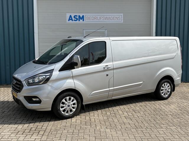 Ford TRANSIT CUSTOM 300 2.0 130Pk TDCI L2H1 Limited / Cruise / Airco / Navi / Trekhaak / Apk t/m 11-10-2026