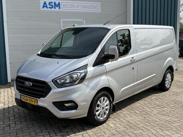 Ford TRANSIT CUSTOM 300 2.0 130Pk TDCI L2H1 Limited / Cruise / Airco / Navi / Trekhaak / Apk t/m 11-10-2026
