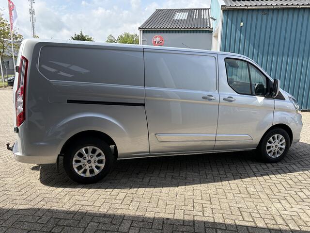 Ford TRANSIT CUSTOM 300 2.0 130Pk TDCI L2H1 Limited / Cruise / Airco / Navi / Trekhaak / Apk t/m 11-10-2026