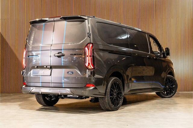 Ford TRANSIT CUSTOM E-Transit 340 L2H1 Sport 65 kWh | 350 KM Range | 360 Camera | Driving Assistant | L+R Schuifdeur | DSS LED | Middenconsole | Navigatie | CarPlay | ACC | Blind Spot | Stuur- en stoelverwarming | Trekhaak | Dakdragers | E-Transit Custom | Zero Emissie