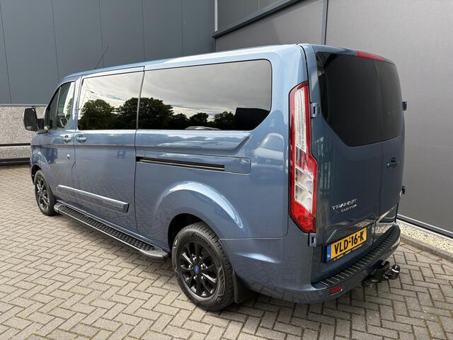 Ford TRANSIT CUSTOM 320 2.0 TDCI L2H1 Platinum Edition DC Automaat Achteruitrijcamera - Parkeersensoren - Navigatie - Airco - Dodehoek detector - Cruise control - Licht metalen velgen 16 inch - Lederen bekleding - Radio - Bluetooth - Dubbele cabine - Tussens - Mistlampen voo