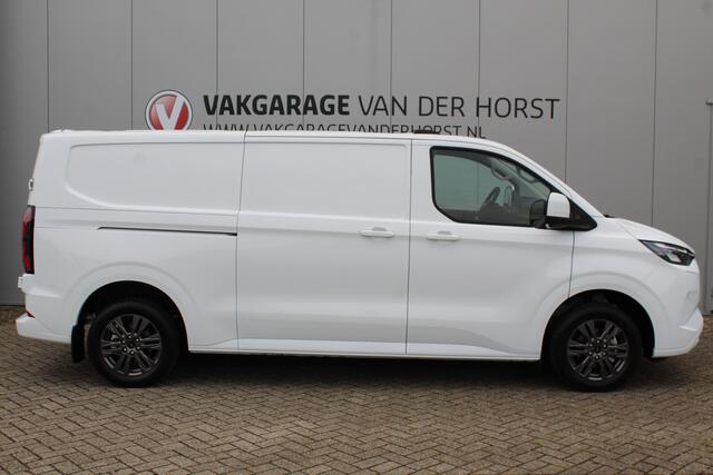 Ford TRANSIT CUSTOM E-Transit ELEKTRISCH 320 L2H1 Limited 65 kWh 218 pk Meerprijs 17" lichtmetalen wielen ¤. 1.500,- Autm. airco, stoel-, spiegel- en voorraamverw., camera, trekhaak, cruise cntrl, navigatie by Apple Carplay/ Android auto, telefoonvoorb., LED verl. etc.