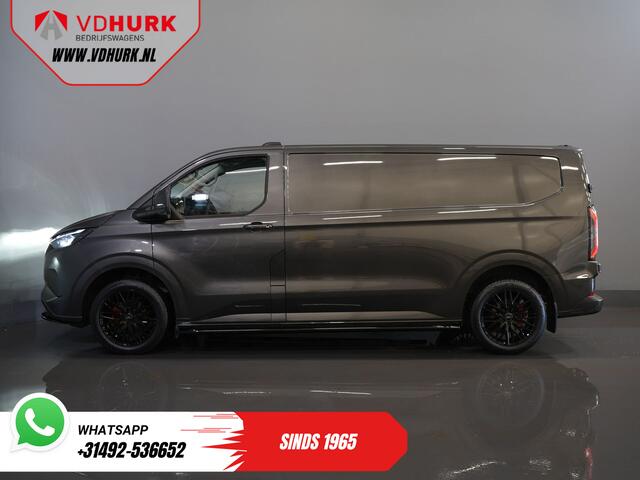 Ford TRANSIT CUSTOM E-Transit L2 Limited 71 kWh 330 km WLTP LED/ Adapt.Cruise/ Standkachel/ Stoelverw./ Frontlip/ Sidebars/ Raptor/ Betimmerd/ Carplay/ 360.Camera/ Climate/ PDC/ 19"LMV/ Trekhaak