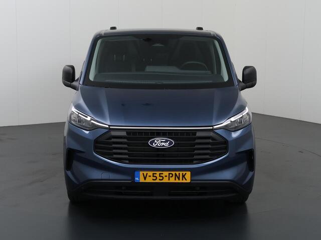 Ford TRANSIT CUSTOM 320 | 2.0 TDCI | L2 H1 | TREND | PARKEERCAMERA | APPLE CARPLAY | ANDROID AUTO | 3-ZITS | CLIMATE CONTROL | VOORRUITVERWARMING | CRUISE CONTROL | METALLIC LAK CHROME BLUE