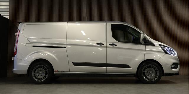 Ford TRANSIT CUSTOM 320 2.0 TDCI L2H1 Raptor Edition | Bi-Xenon | CarPlay | Navigatie | Camera | Stoelverwarming | Dodehoek detector | Lane Assist | DAB | 3-Zitter | Dealer onderhouden | Nieuwe APK