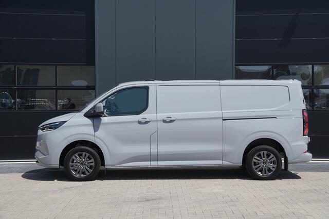 Ford TRANSIT CUSTOM E-Transit 340 L2H1 Limited 71 kWh 218pk - 2x Schuifdeur - AGR Bestuurdersstoel - Trekhaak - ACC - B&O - Navi - Stoel/Stuurverwarming - 360 Camera - Blindspot - Rijklaar