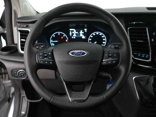Ford TRANSIT CUSTOM 320 2.0 TDCI 130pk L2H1 Limited DC | Camera | Leer | El. verst. stoel | Stoelverw. | Voorruitverw. | 6-zits | Adapt. cruise | 100% dealer onderh.