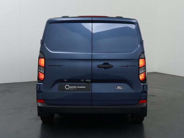Ford TRANSIT CUSTOM 320 | 2.0 TDCI | L2 H1 | TREND | PARKEERCAMERA | APPLE CARPLAY | ANDROID AUTO | 3-ZITS | CLIMATE CONTROL | VOORRUITVERWARMING | CRUISE CONTROL | METALLIC LAK CHROME BLUE