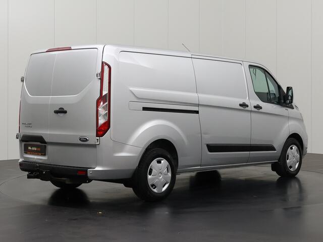 Ford TRANSIT CUSTOM 2.0TDCi 130PK Lang | Werkplaatinrichting | Navigatie | Camera | 3-Zits | Trekhaak | Airco | Cruise