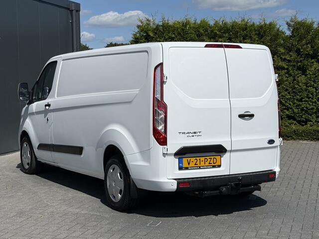 Ford TRANSIT CUSTOM 2.0 TDCI 130 PK / L2H1 / AUTOMAAT / TREKHAAK / AIRCO / CRUISE / CAMERA / 3-ZITS / LED / STOEL -EN VOORRUIT VERWARMING