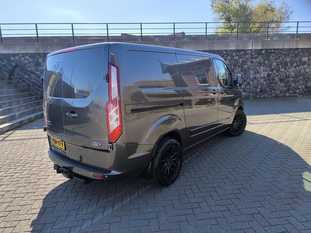 Ford TRANSIT CUSTOM 320 2.0 TDCI L1H1 Limited 130PK euro6, Stoel verwarming, carplay, trekhaak, LM velgen, airco en cruise control, nette bedrijfs bus rook vrij.
