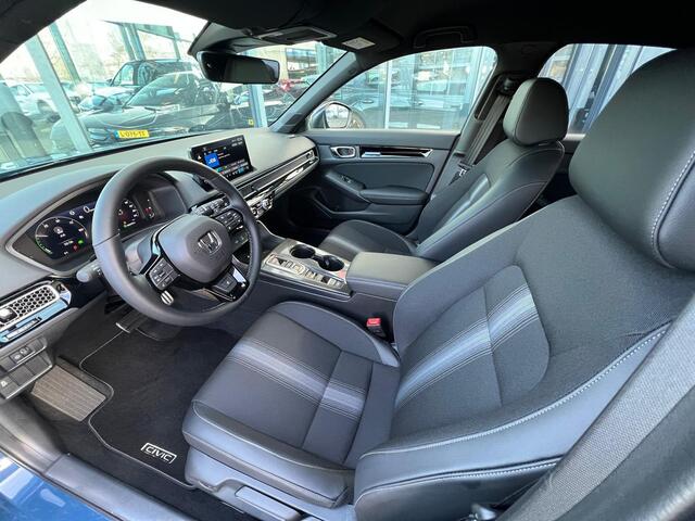 Honda CIVIC 2.0 e:HEV Sport | FULL HYBRID | 18 INCH | APPLE & ANROID AUTO | CAMERA | STUUR + STOELVERWARMING | NAVIGATIE |
