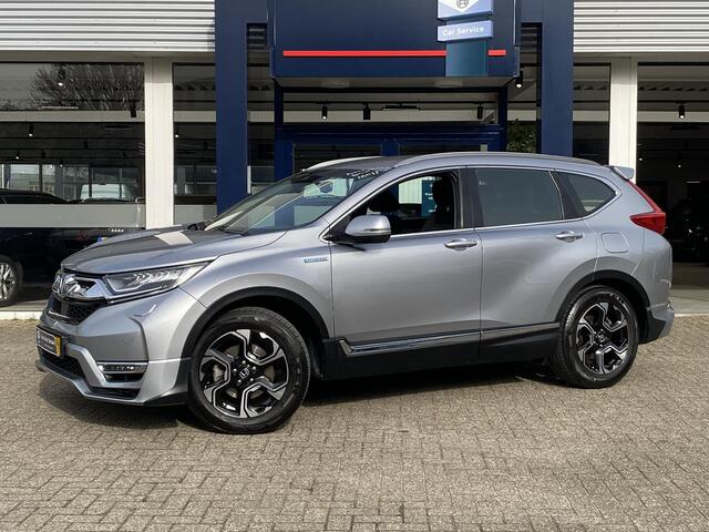 Honda CR-V 2.0 Hybrid Business Edition / Automaat / NL-Auto / Adaptieve Cruise-Control / Stoelverwarming / Trekhaak / Climate-Control / Apple-Carplay & Android-Auto / DAB Radio-Bluetooth / Navi / PDC V+A met Camera / 18'' LMV / ENZ.