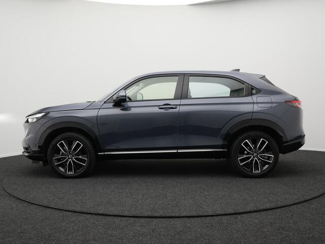 Honda HR-V 1.5 e:HEV Elegance Hybrid Dealer O.H. | Half Lederen Sportstoelen | Adaptive Cruise | Apple Carplay | DAB | Navigatie | Camera | L.M. 18" | Virtual | Stoelverwarming |