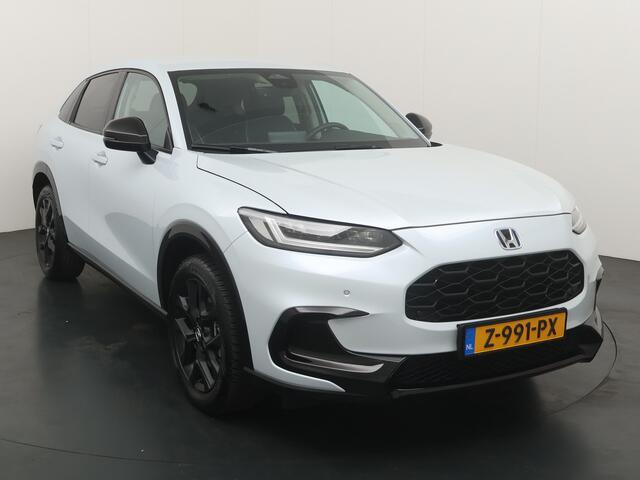 Honda ZR-V 2.0 184PK HEV Sport | Elekt. stoel | Adapt. cruise | Stoelverwarming | Clima | Elekt. kofferklep | Halfleder/stof | Keyless