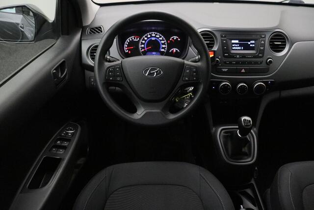 Hyundai I 10 1.0i Comfort 2018 | 1e Eigenaar | Cruise Control | Trekhaak | Lichtmetalen Velgen | Stuurwiel Bediening | Boekjes | 2 Sleutels | Nationale Autopas