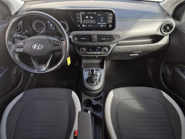 Hyundai I 10 1.0 / All season banden / Stuur- & Stoel verwarming / Navigatie via Apple Carplay of Android Auto / Climate control / Achteruitrijcamera / Cruise control / Elektrische ramen voor /