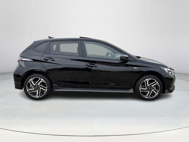 Hyundai I 20 1.0 T-GDI N Line Sky | Sportuitlaat | BOSE Premium audio | Adaptive cruise control | Lane keeping assistent | Stoel/stuurverwarming | Achteruitrijcamera | Parkeerhulp voor+achter | Schuif-kantel dak |