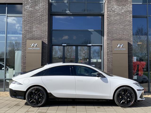 Hyundai IONIQ 6 First Edition AWD 77 kWh met Panoramisch schuifdak, 20 inch Lichtmetalen velgen en 4 Wheel Drive Uit voorraad leverbaar