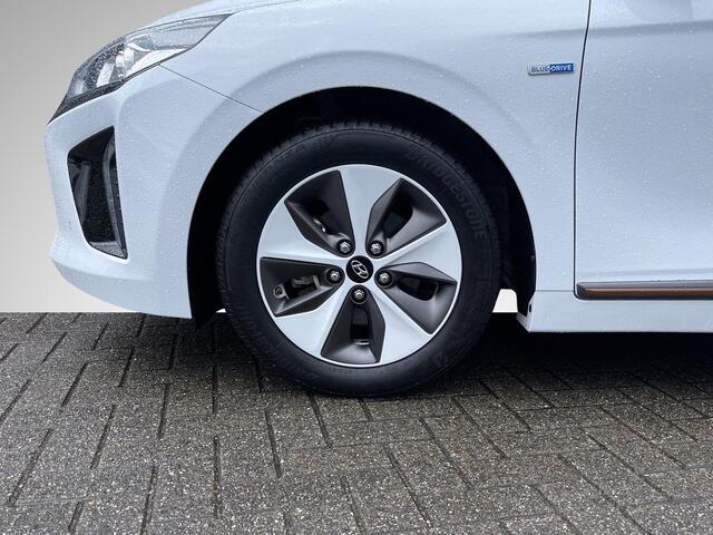 Hyundai IONIQ Premium EV *SUBSIDIE MOGELIJK* | Schuif-/Kanteldak | Leder | Geheugenstoel | Stuur- + Stoelverwarming | Adapt. Cruise Control | Rijklaarprijs!