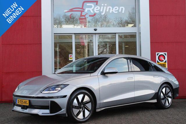 Hyundai IONIQ 6 CONNECT 77 kWh WARMTEPOMP | VOORVERWARMING | NAVIGATIE | STOELVERWARMING | STUURVERWARMING | HEAD-UP DISPLAY | DODEHOEK DETECTIE | ELEKTRISCHE VOOSRSTOELEN | ACHTERBANK VERWARMING | ELEKTRSICH BEDIENBARE ACHTERKLEP | DRAADLOOS TELEFOONLADEN | VEHICLE TO
