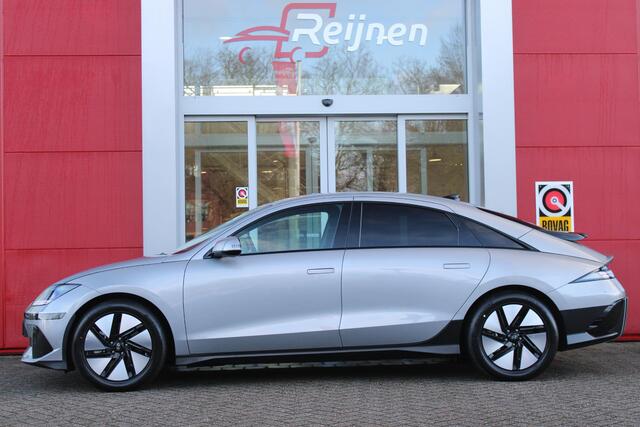Hyundai IONIQ 6 CONNECT 77 kWh WARMTEPOMP | VOORVERWARMING | NAVIGATIE | STOELVERWARMING | STUURVERWARMING | HEAD-UP DISPLAY | DODEHOEK DETECTIE | ELEKTRISCHE VOOSRSTOELEN | ACHTERBANK VERWARMING | ELEKTRSICH BEDIENBARE ACHTERKLEP | DRAADLOOS TELEFOONLADEN | VEHICLE TO