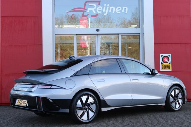 Hyundai IONIQ 6 CONNECT 77 kWh WARMTEPOMP | VOORVERWARMING | NAVIGATIE | STOELVERWARMING | STUURVERWARMING | HEAD-UP DISPLAY | DODEHOEK DETECTIE | ELEKTRISCHE VOOSRSTOELEN | ACHTERBANK VERWARMING | ELEKTRSICH BEDIENBARE ACHTERKLEP | DRAADLOOS TELEFOONLADEN | VEHICLE TO