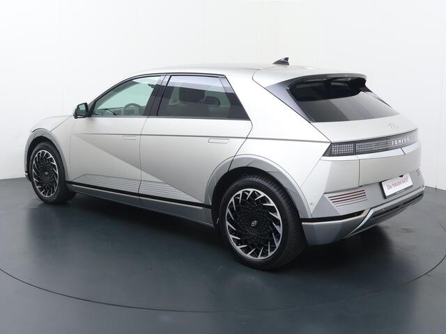 Hyundai IONIQ 5 Lounge 77.4 kWh | SoH 100% | Automaat | Multifunctioneel stuurwiel | Autohold | Automatische verlichting | Automatische achterklep | Inklapbare spiegels | Spraakbediening | Bluetooth | Stoelverwarming/Stoelventilatie | Climate | Navigatie | Apple Carpla