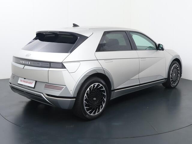 Hyundai IONIQ 5 Lounge 77.4 kWh | SoH 100% | Automaat | Multifunctioneel stuurwiel | Autohold | Automatische verlichting | Automatische achterklep | Inklapbare spiegels | Spraakbediening | Bluetooth | Stoelverwarming/Stoelventilatie | Climate | Navigatie | Apple Carpla
