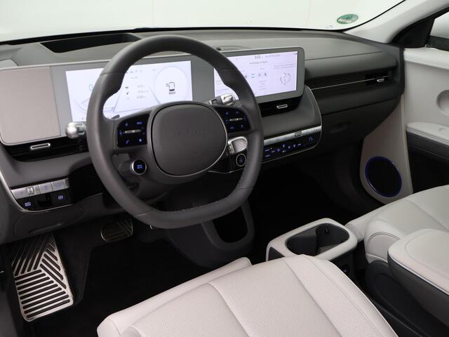 Hyundai IONIQ 5 Lounge 77.4 kWh | SoH 100% | Automaat | Multifunctioneel stuurwiel | Autohold | Automatische verlichting | Automatische achterklep | Inklapbare spiegels | Spraakbediening | Bluetooth | Stoelverwarming/Stoelventilatie | Climate | Navigatie | Apple Carpla