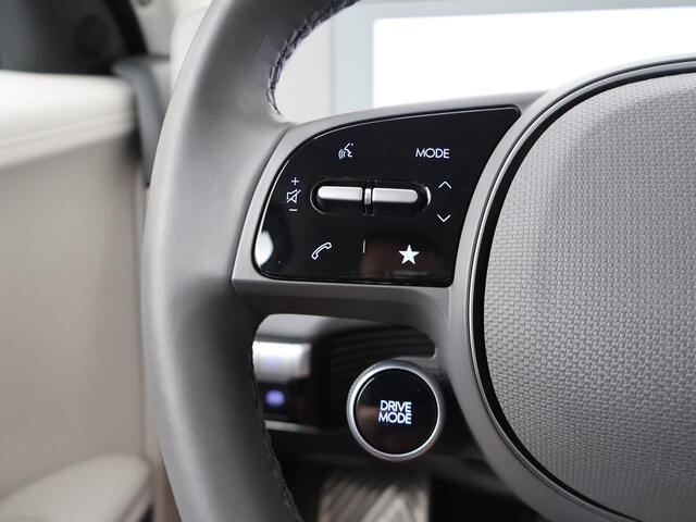 Hyundai IONIQ 5 Lounge 77.4 kWh | SoH 100% | Automaat | Multifunctioneel stuurwiel | Autohold | Automatische verlichting | Automatische achterklep | Inklapbare spiegels | Spraakbediening | Bluetooth | Stoelverwarming/Stoelventilatie | Climate | Navigatie | Apple Carpla