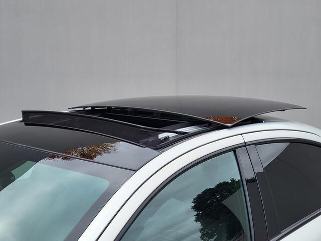 Hyundai IONIQ 6 First Edition AWD 77.4 kWh Automaat / 100% SOH / Origineel NL Auto / tot 04-2009 Fabrieksgarantie / Allseason banden / Schuifkanteldak / 360° camera / Navigatie / Headup Display / Android Auto / Apple Carplay / BOSE audio / Stuur-, voorstoel- en achterb