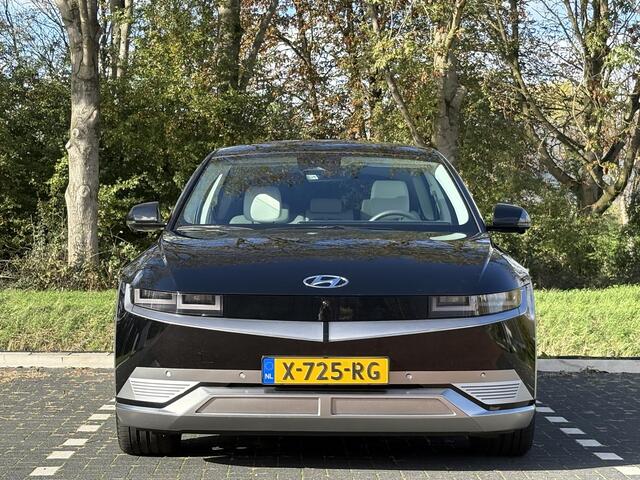 Hyundai IONIQ 5 Lounge AWD 77.4 kWh | Panoramadak | Lederen bekleding & memory functie | Warmtepomp & V2L | Geïntegreerde navigatie | Apple Carplay & Android Auto | Adaptieve Cruisecontrol | Camera | Warmtepomp | Stoel & stuur verwarming | Premium audio BOSE |