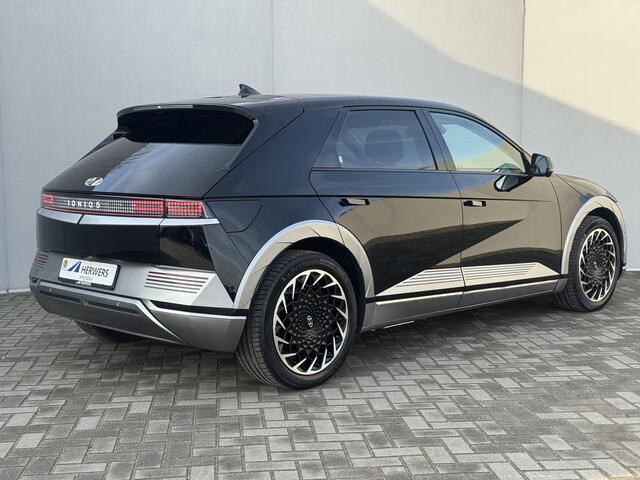 Hyundai IONIQ 5 Lounge 73kWh / Accu SOH 99.8% / Fabrieksgarantie tot 10-2026 / Dealer onderhouden / WLTP 451 km / CCS snelladen / Warmtepomp / Stuur-, Stoel en Achterbank verwarming / Adaptief CC /