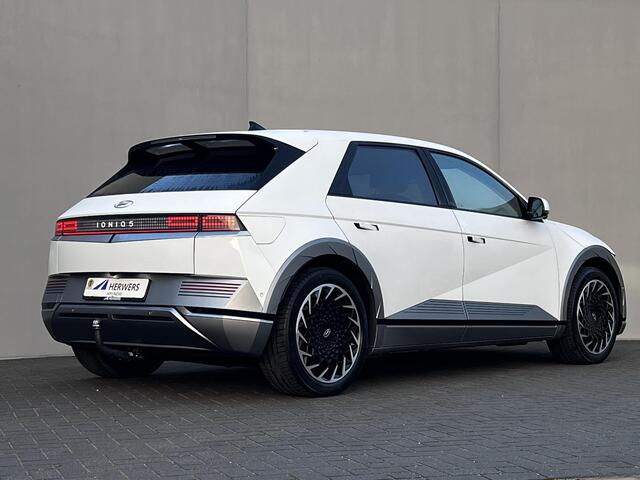 Hyundai IONIQ 5 Lounge 73kWh Automaat / Fabrieksgarantie tot 11-2026* / Batterij 8 jaar garantie / Accu SoH 100% / Afn. trekhaak 1.600 kg / HUD / Camera 360° / Stoelventilatie / Stuur-, stoel- en achterbankverwarming / Adapt. CC / 20"LM wielen / Winterwielen set gebrui