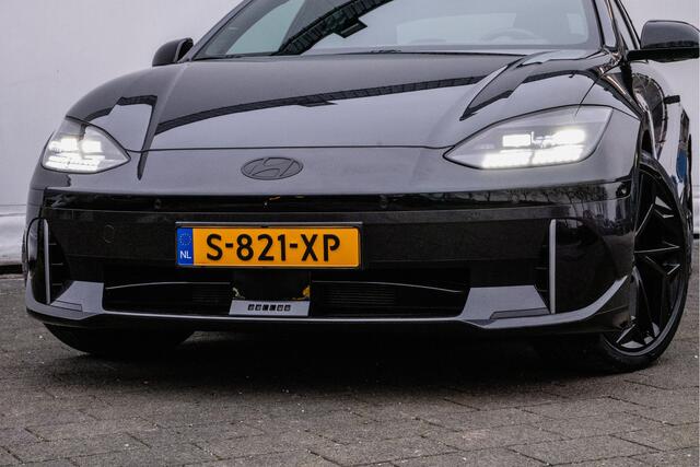 Hyundai IONIQ 6 First Edition AWD 77.4 kWh Schuifdak/ Camera/ Stoel-stuurverwarming/ Navigatie/ Carplay/ Memory/ 20" Lmv