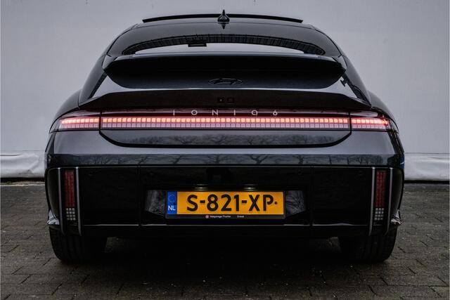 Hyundai IONIQ 6 First Edition AWD 77.4 kWh Schuifdak/ Camera/ Stoel-stuurverwarming/ Navigatie/ Carplay/ Memory/ 20" Lmv