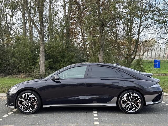 Hyundai IONIQ 6 Lounge 77.4 kWh | Lederen bekleding | Warmtepomp & V2L | Geïntegreerde navigatie | Apple Carplay & Android Auto | Adaptieve Cruisecontrol | Camera | Warmtepomp | Stoel & stuur verwarming | Premium audio BOSE |