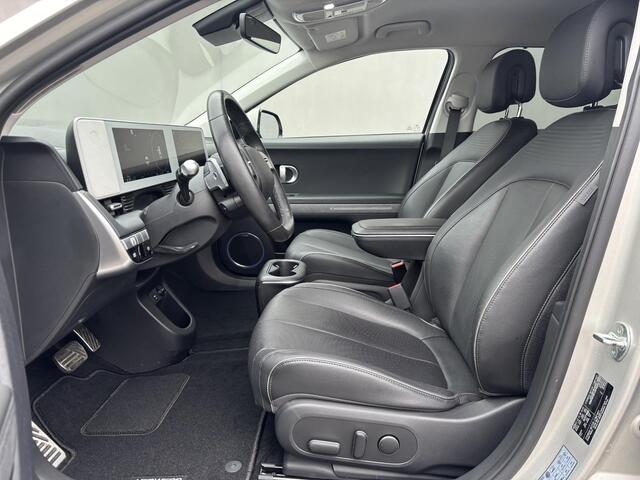 Hyundai IONIQ 5 Lounge 73kWh Automaat / 1.600 kg trekgewicht / 8 jaar Batterijgarantie / Accu SoH 100 % / CCS snelladen / Warmtepomp / HUD / Camera 360° / Leder / Elektrische stoelen & klep / Navigatie / Stuur-, stoel- & achterbankverwarming / 20" LM wielen /