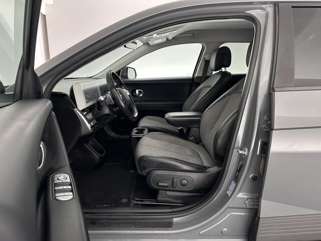 Hyundai IONIQ 5 Connect 73kWh [ 3-Fase ] {SOH-100%} (INCL-BTW) Aut *LEATHER-FABRIC | FULL-LED | DIGI-COCKPIT | AMBIENT-LIGHT | DAB | SHIFT-PADDLES | HEAD-UP | NAVI-FULLMAP | KEYLESS | CAMERA | HEATED-COMFORTSEATS | TOWBAR*