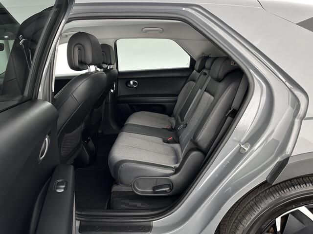 Hyundai IONIQ 5 Connect 73kWh [ 3-Fase ] {SOH-100%} (INCL-BTW) Aut *LEATHER-FABRIC | FULL-LED | DIGI-COCKPIT | AMBIENT-LIGHT | DAB | SHIFT-PADDLES | HEAD-UP | NAVI-FULLMAP | KEYLESS | CAMERA | HEATED-COMFORTSEATS | TOWBAR*