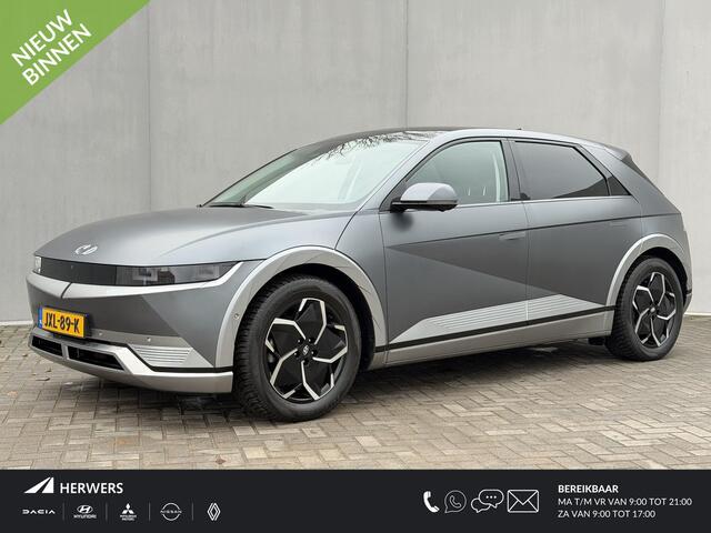 Hyundai IONIQ 5 Lounge 73kWh Automaat / Panoramadak / Dealer onderhouden / Fabrieksgarantie tot 12-2026 / 8 Jaar Batterij Garantie / All Season banden / Warmtepomp / HUD / 360 Camera / Navigatie / Elektr. stoelen + Memory / Stoel & Stuurwiel Verwarming / Stoel Ventila