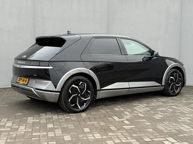 Hyundai IONIQ 5 Lounge AWD 77.4 kWh 325Pk Automaat / SOH 98% / Afn. Trekhaak / Dealer onderhouden / Fabrieksgarantie tot 11-2027 / 8 Jaar Batterij Garantie / Warmtepomp / HUD / 360 Camera / BOSE / Navigatie / Adaptieve Cruise / Elektr. Stoelen / Elektr. Achterklep / St