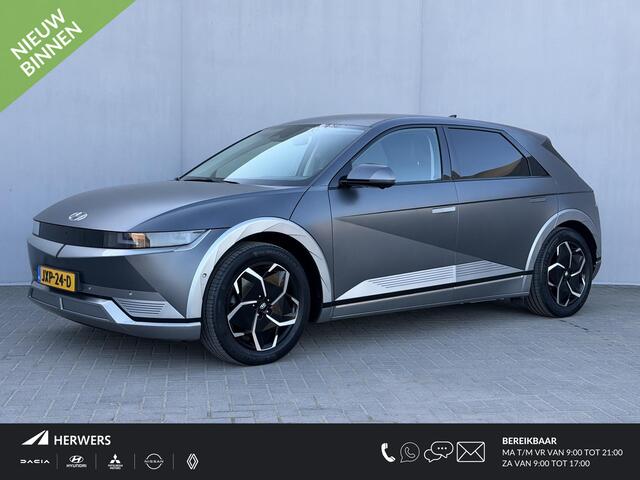 Hyundai IONIQ 5 Lounge AWD 73kWh Automaat / Trekhaak / SOH 100% / Dealer onderhouden / Fabrieksgarantie tot 12-2026 / Warmtepomp / 8 Jaar Batterij Garantie / HUD / 360 Camera / BOSE / Elektr. Stoelen met Memory Functie / Lederen Bekleding / Stoel Verwarming / Stuurwiel